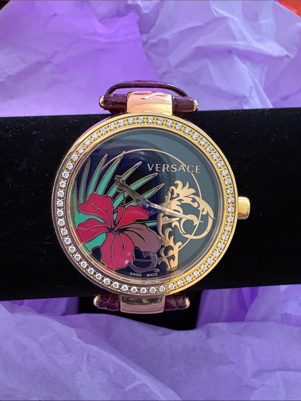 Versace Gold-Tone Watch with Pink Flower and Green Leaf Accents